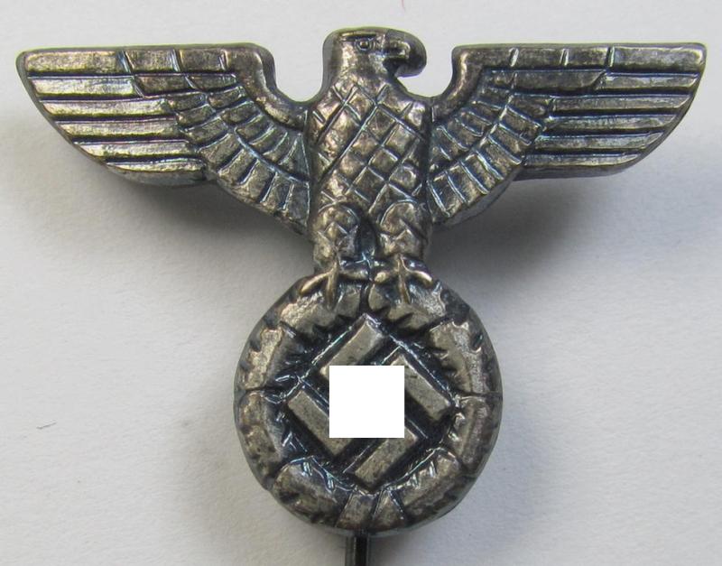 Silverish-coloured - and truly very detailed! - so-called: 'N.S.D.A.P.'-supporter- (ie. membership-) lapel-pin (ie. 'tie'-pin) being a maker- (ie. 'R. Souval'-) marked example showing a pronounced 'Reichsadler'-device