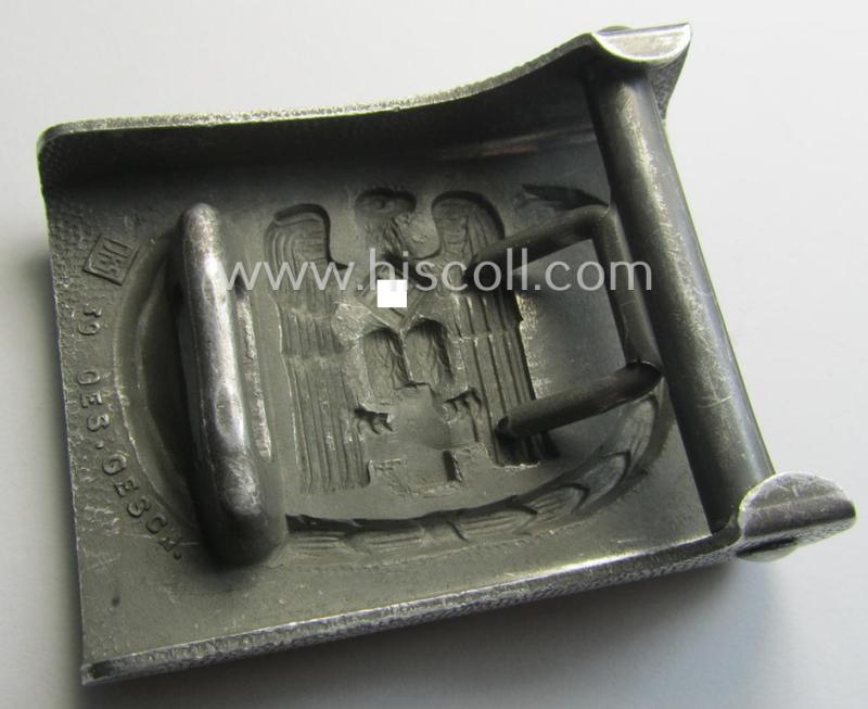 Aluminium-based, so-called: DRK (ie. 'Deutsches Rotes Kreuz'), enlisted-mens'- (ie. NCO-) type belt-buckle being a maker- (ie. 'JFS'-) marked and: 1939-dated example