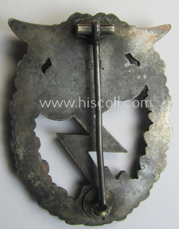 Mid- (ie. later-war-) period, zinc- (ie. 'Feinzink'-) based version of a WH (Luftwaffe) 'Erdkampfabzeichen' having a separate eagle-device attached and being a maker- (ie. 'G.B.' or 'Gustav Brehmer'-) marked example