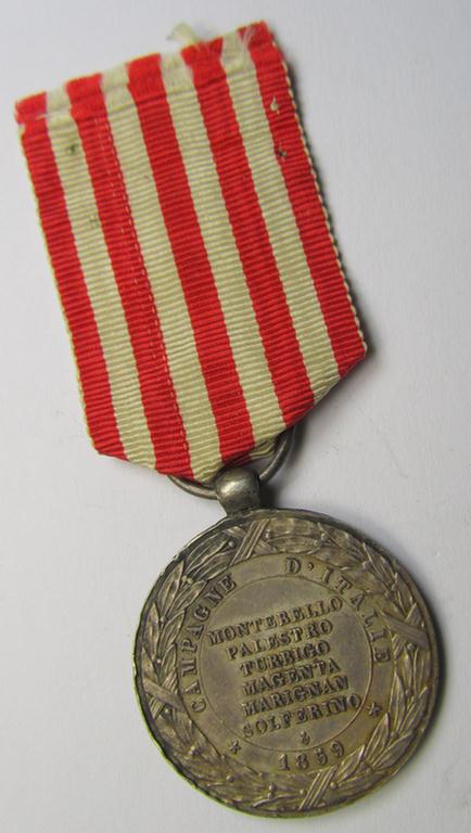 Attractive French, 'Second Empire-period', so-called: 'Expedition to Italy'-campaign-medal (ie. 'Médaille Commémorative de l'Expédition du Italie') that comes mounted on its period-ribbon as issued