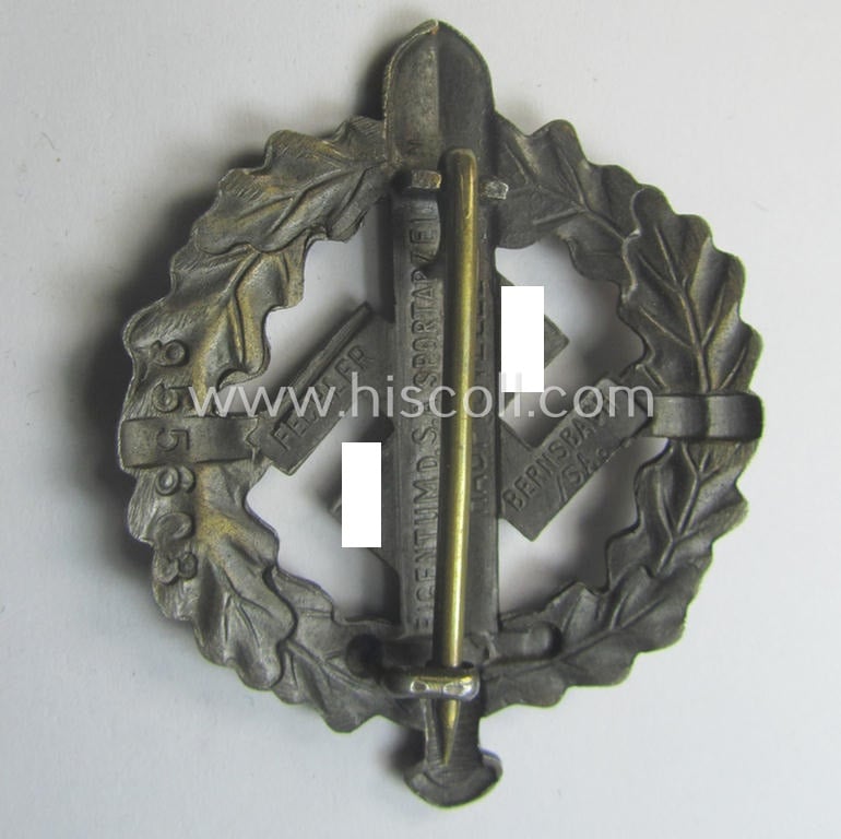 Early- (ie. pre-) war-period example of an: 'SA-Sportabzeichen in Bronze' being a detailed and/or neatly maker- (ie. 'Fechler - Bernsbach i. Sa.'-) marked example that shows an impressed bearers'-number (ie. '955603')