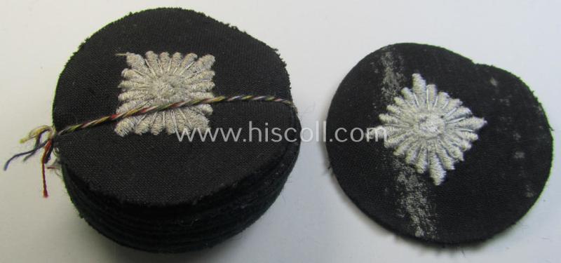 WH (Heeres) rank-insignia (ie. silver-grey-coloured and machine-embroidered 'roundel') as intended to identify a soldier with the rank of: 'Oberschütze', 'Oberjäger' etc. that comes in a 'virtually mint- ie. unissued', condition