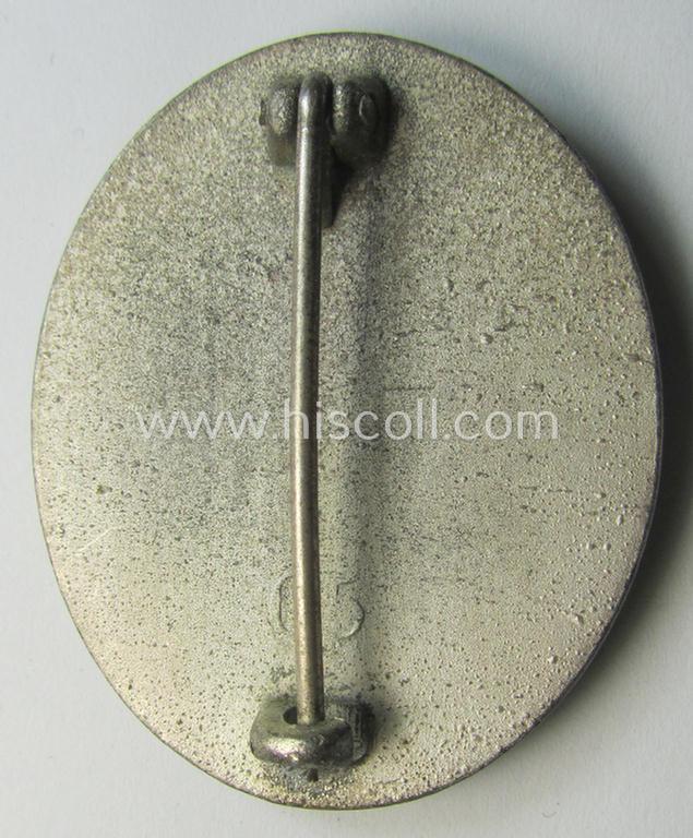 Attractive - and moderately used- and worn! - example of a maker- (ie. '65'-) marked example of a silver-class wound-badge (or: 'Verwundeten-Abzeichen in Silber') as was produced by the 'Hersteller' ie. maker: 'Klein u. Quenzer'