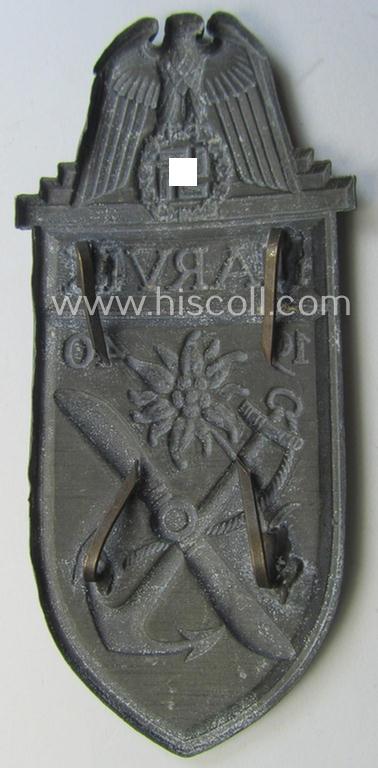 'Virtually mint' - albeit regrettably incomplete - example of a WH (Heeres, LW ie. Waffen-SS) 'Narvik'-campaign-shield as executed in typical: 'Feinzink' (as was presumably produced by the: 'Wilhelm Deumer'-company)