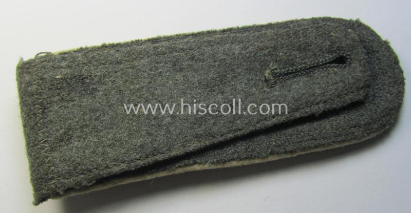 Attractive - moderately used albeit regrettably single! - neatly 'cyphered', so-called: 'M41- (ie. M43-) pattern', WH (Heeres) NCO-type shoulderstrap as was specifically intended for a: 'Feldwebel des Maschinengewehr-Abteilungs 4'