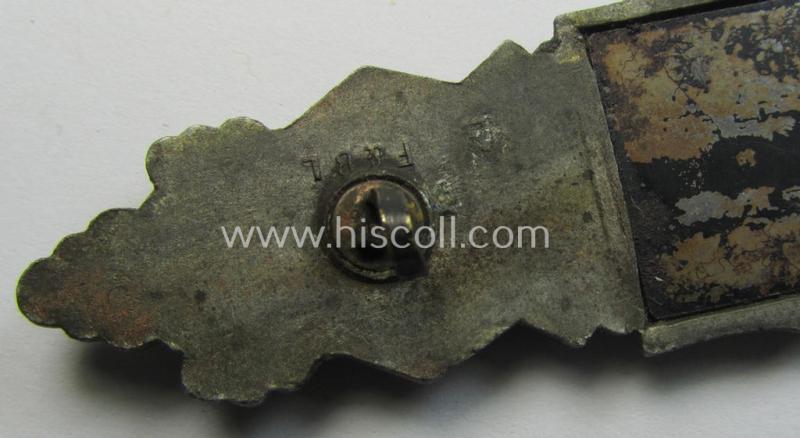 'Nahkampfspange in Bronze' (or: bronze-class close-combat clasp ie. CCC) being a maker- (ie. 'F.&B.-L.'-) marked- and/or minimally converse-shaped specimen as was produced by the maker- (ie. 'Hersteller') 'Funcke u. Brüninghaus'