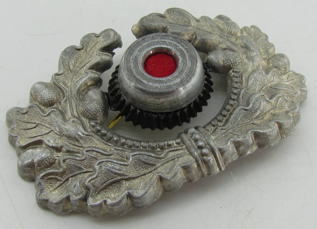 Wehrmacht (Heer) visor cap wreath and cocarde ( DRGM marked )