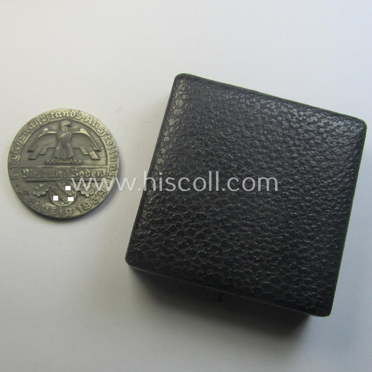 Greyish-silver-toned, 'Reichsnährstand'- (ie. 'RNSt.'-) related, commemorative-award-plaque entitled: '5. Reichsnährstands-Austellung - Blut und Boden - Leipzig 1939 - Frischbutter' and that comes stored in its period etui