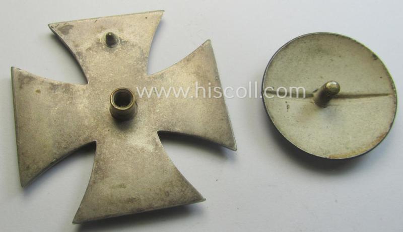 Moderately used, Iron Cross 1st class (or: 'Eisernes Kreuz 1. Klasse') as executed in the scarcely seen so-called: 'screw-back'- (ie. 'An der Schraube'-) pattern being a non-maker-marked example