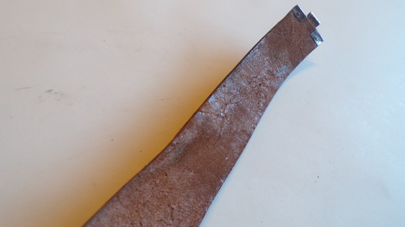 S.A brown leather belt and buckle