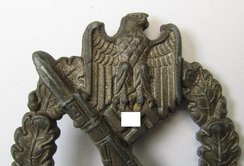 Attractive, 'hollow-back' 'Infanterie Sturmabzeichen in Silber' (or: silver infantry-assault badge ie. IAB) being a non-maker-marked example as executed in zinc-based metal (ie. 'Feinzink') as was produced by the: 'Wilh. Deumer'-company