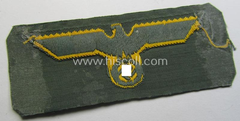WH (Kriegsmarine o. Küsten-Artillerie) early- (ie. mid-war-) period- and/or golden-yellow-coloured WH (Heeres) type side-cap-eagle as executed in the neat 'BeVo'-weave pattern onto a field-grey-coloured background