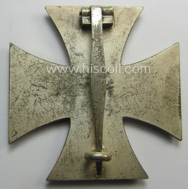 'Eisernes Kreuz 1. Klasse' (ie. Iron Cross 1st class) being an early-pattern (and clearly maker- ie. '3'-marked!) example as was produced by the: 'Wilh. Deumer'-company