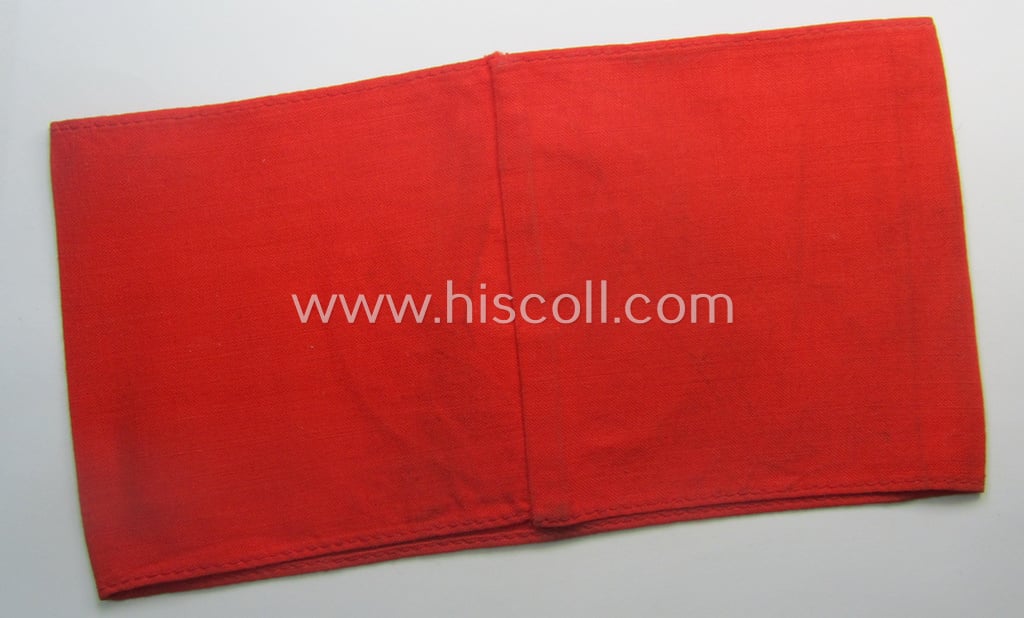 Moderately used and/or worn, linnen-based armband (ie. 'Armbinde') as was intended for usage by the staff of the: 'SA-Wehrmannschaften' (being a worn example that still retains its period-attached 'RzM'-etiket)