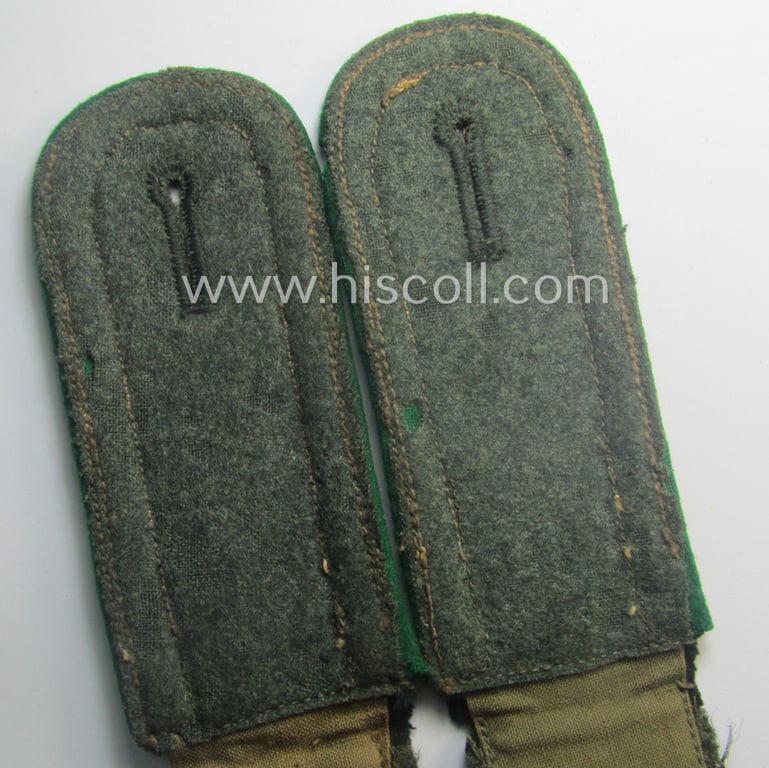 Somewhat moth-damaged - but nevertheless quite scarcely found! - pair of WH (Heeres) NCO-type (ie. 'M40'-pattern) shoulderstraps as was intended for usage by an: 'Uffz. eines Gebirgsjäger-Rgts.'