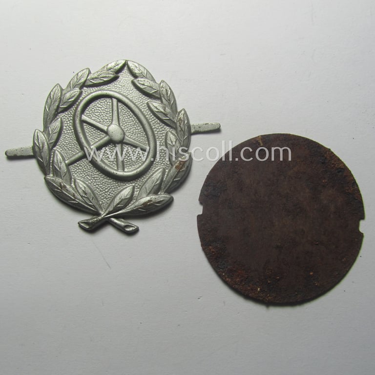 WH (Heeres, LW ie. Waffen-SS-) so-called: 'Kraftfahrbewährungs-Abz. in Silber' being a 'virtually mint' example as was (I deem) produced by the Austrian-based maker: 'Rudolf Souval - Wien VII/62' and that came stored in its 'Zellstoff'-based pouch