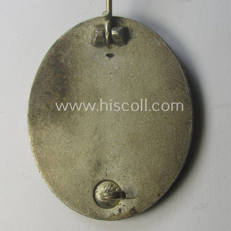 'Verwundeten-Abzeichen in Silber' (or: silver-class wound-badge) being a neatly maker- (ie. '100'-) marked example by the: 'Rudolf Wächter u. Lange'-company