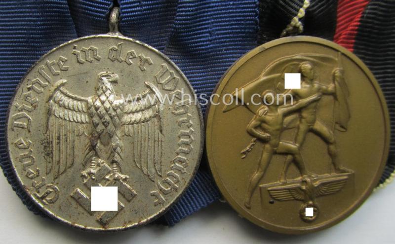Attractive example of a two-pieced WH (Heeres o. KM) medal-bar (ie.: 'Doppelspange') resp. showing a: 'WH-DA 4. Stufe' (with firmly attached eagle-device!) and a Czech 'Anschluss'-medal