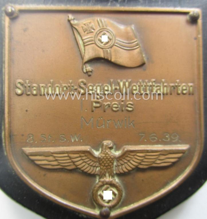 Golden-bronze-toned, so-called: 'nichttragbarer Ehrenpreis' (ie. commemorative-plaque) showing the text: 'Standort-Segel-Wettfahrten 1. Preis' and engraving: 'Mürwik - 8.St.S.W. - 7.6.1939'