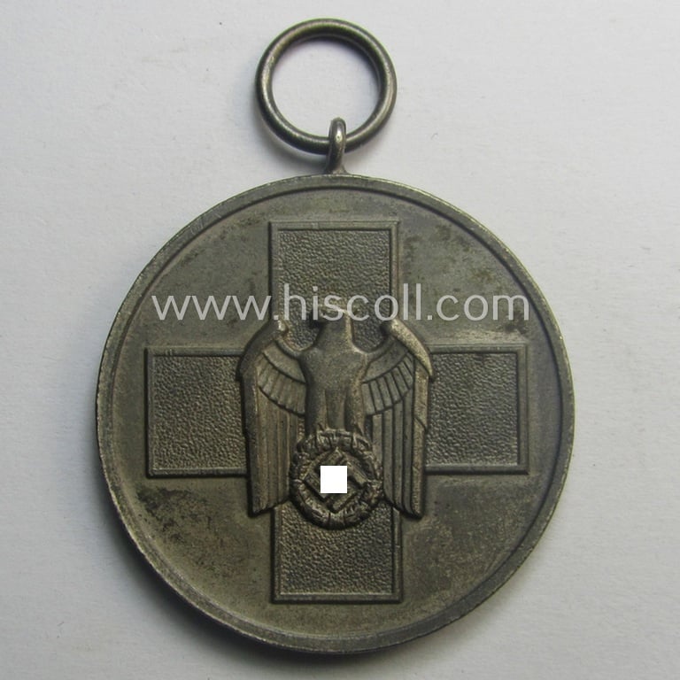Medal-set: 'Medaille für Deutsche Volkspflege' being a non-maker-maker-marked specimen that comes still packed in its original (but damaged) pouch of issue by the 'Gebr. Godet'-company as issued and/or recently found