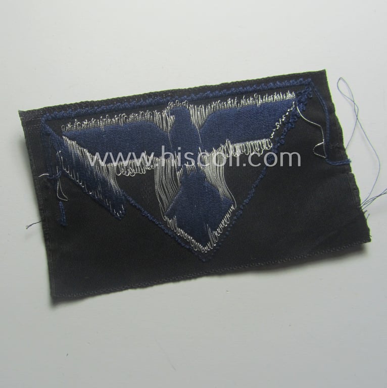 TeNo (ie. 'Technische Nothilfe') (I deem) officers'-pattern side-cap-eagle (ie. 'Adler für Offiziers-Schiffchen') being an example as executed in so-called: 'BeVo'-weave, 'flat-wire'-pattern on a darker-blue-coloured background