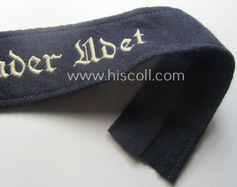 Moderately used, WH (Luftwaffe) cuff-title ie. armband (ie. 'Ärmelstreifen') entitled: 'Jagdgeschwader Udet' that comes in a clearly worn- ie. minimally period-shortened-, condition