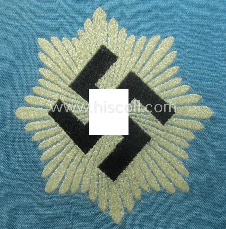 Light-blue-coloured and neatly 'BeVo'-woven, so-called: RLB (or: 'Reichsluftschutzbund') 'Amtsträger'-armband depicting the typical 'RLB'-logo (without lettering) and showing an interwoven makers'-designation (ie. 'BeVo - Wuppertal')