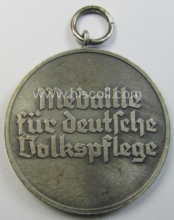 Attractive medal-set: 'Medaille für Deutsche Volkspflege'  being a typical non-maker-maker-marked specimen that comes packed in its original pouch of issue by the: 'E. Ferd. Wiedmann'-company as issued and/or recently found