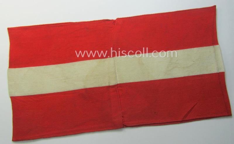 'Standard-issued'-pattern (ie. entirely woven) pattern, bright-red-coloured HJ- (ie. 'Hitlerjugend'-) related armband (ie. 'Armbinde') being a moderately worn- ie. used example that still retains its period 'RzM'-etiket