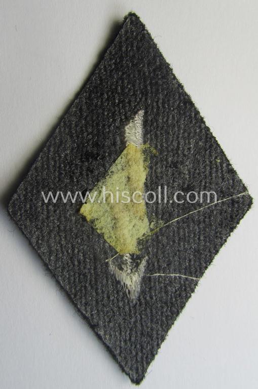 Waffen-SS-pattern, machine-embroidered and black-coloured sleeve-insignia (ie. 'Ärmelraute') depicting a: 'Signalblitz' ('SS-Nachrichten-Trpn.')