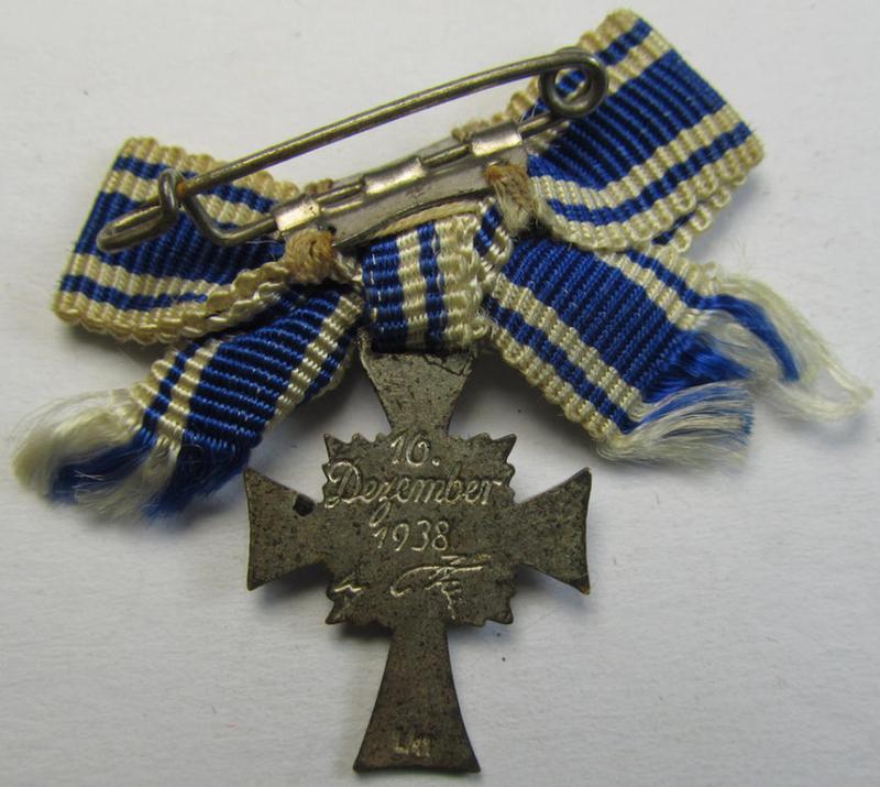 Miniature of an: 'Ehrenkreuz der deutschen Mutter - zweite Stufe' (or: mothers'-cross in silver) being a neatly maker- (ie. 'L/11'-) marked example that comes stored in its period, generic-styled so-called: 2-pieced- & 'LDO'-marked box (ie. et...