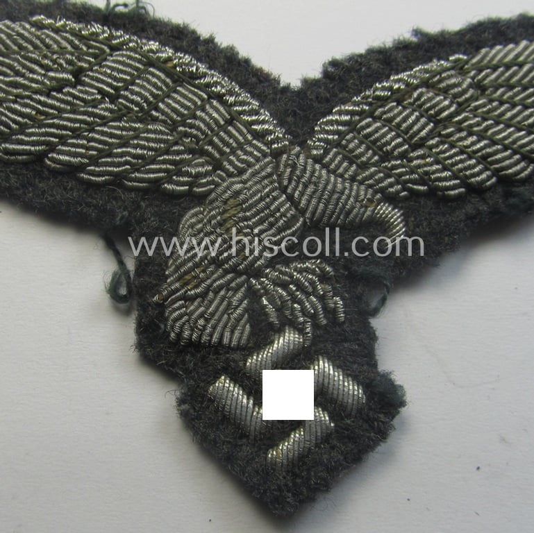 WH (Luftwaffe) officers'-pattern breast-eagle (ie. 'Brustadler für Offiziere der Luftwaffe') being a neatly hand-embroidered example of the: 'Extra Qualität' that comes in a moderately used- (ie. carefully tunic-removed-), condition