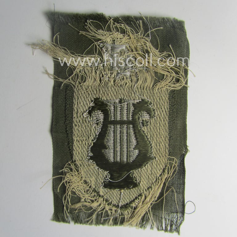 Rarely seen, RAD (ie. 'Reichsarbeitsdient') officers'-pattern armbadge as executed in neat 'BeVo'-weave 'flat-wire' pattern as was intended for usage by a: 'Muzikzug-Führer' (ie. 'RAD-Obermuzikzug-Führer')