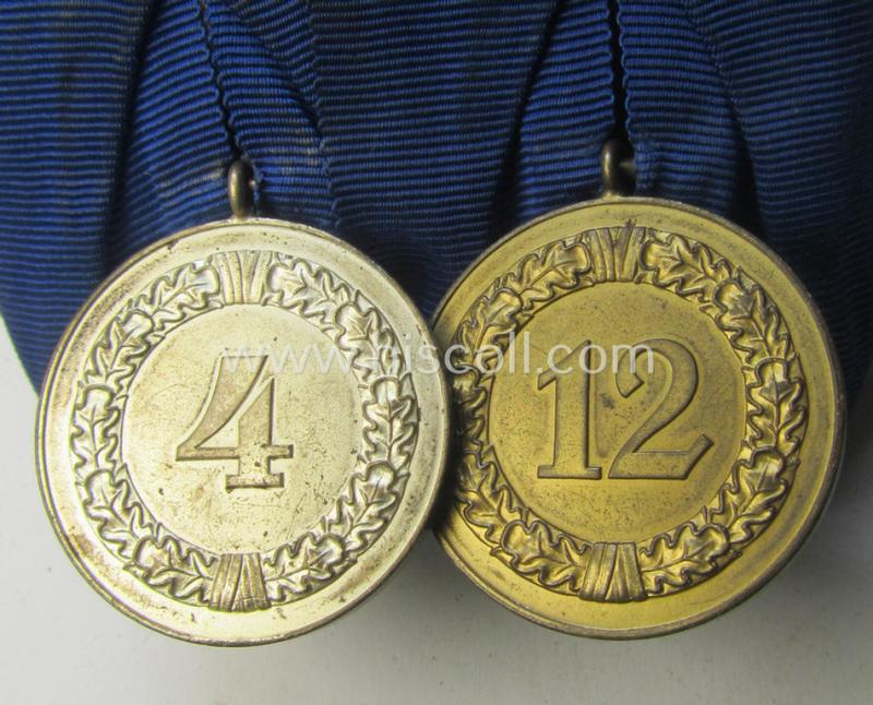 Attractive - and truly used! - two-pieced medal-bar (ie. 'Spange') showing two: WH (Heeres o. Kriegsmarine) so-called: 'Dienstauszeichnungen für 4 u. 12 Jahre Treue Dienste' that both come period-mounted as a so-called: 'Doppelspange'