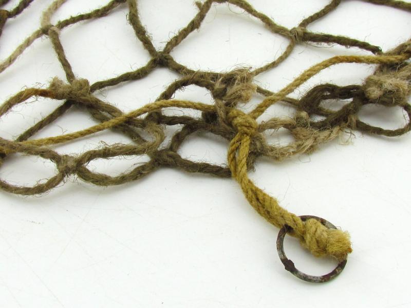 Complete late war German helmet net with attachment hooks