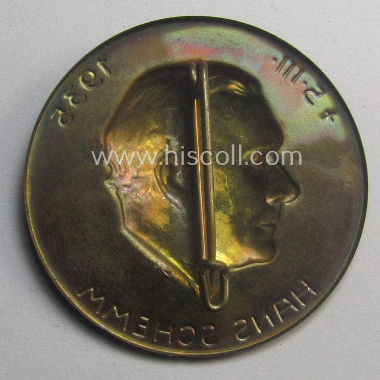 Commemorative, golden-bronze-toned, so-called: 'N.S.D.A.P'-related day-badge (ie. 'tinnie') showing an illustration of the: 'Gauleiter' of the 'Gau Bayreuth' Hans Schemm, commemorating his death on 5 March 1935