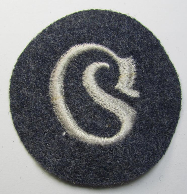 WH (Luftwaffe) machine-embroidered, trade- ie. special-career ie. proficiency patch (ie. 'Laufbahn- o. Tätigkeitsabzeichen') as was specificallly intended for usage by: 'Schirrmeister'