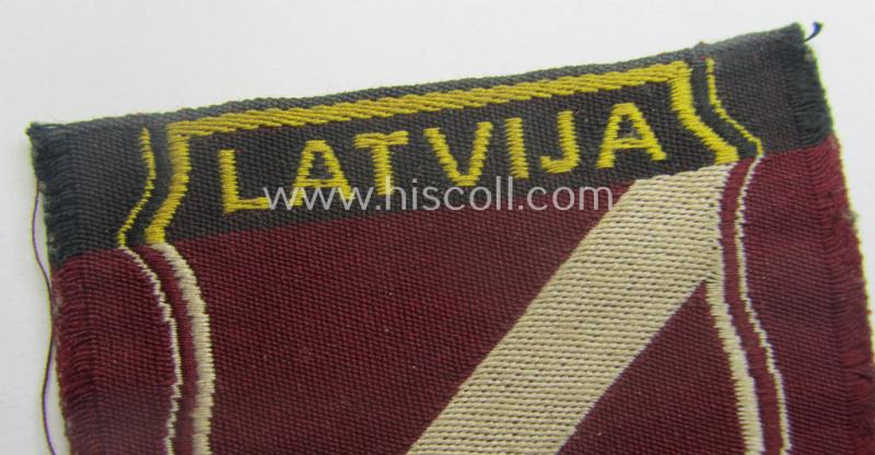 Locally produced(!), 'Waffen-SS'-type armshield as executed in the so-called: 'semi-BeVo'-pattern entitled: 'Latvia' as was merely intended for usage by the members of the: 'Latvian Legion'