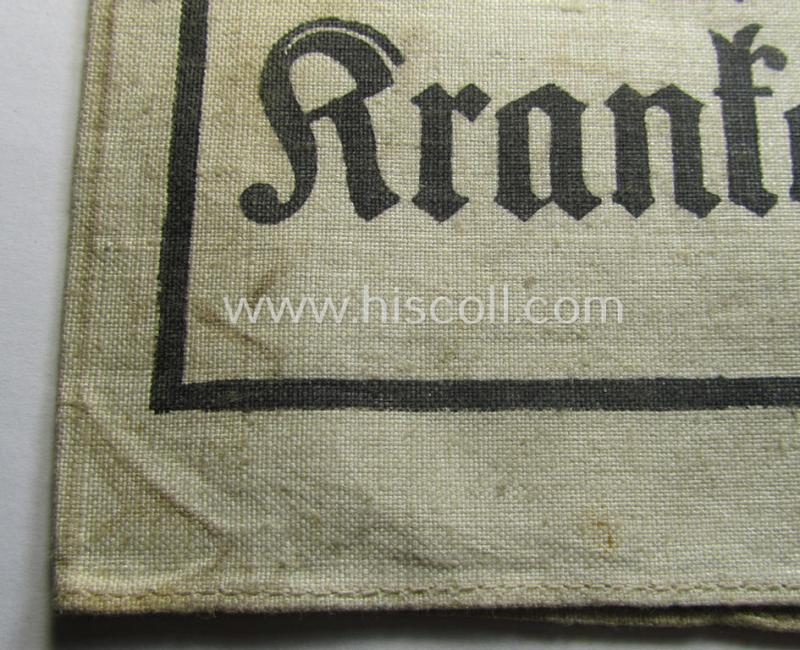 Neat, beige/white-coloured- and/or linnen-based armband (ie. 'Armbinde') as was executed in the 'thicker-styled' fabric as was intended for WH (Heeres) staff-members working as: 'Hilfs-Krankenträger'