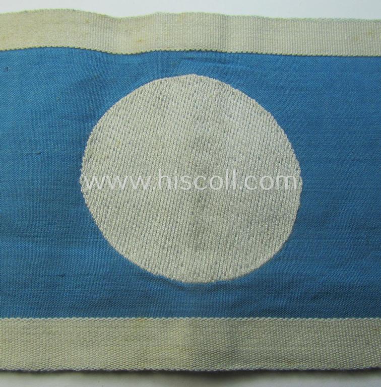 Superb, linnen-based- and/or light-blue-coloured armband (ie. 'Armbinde') depicting an interwoven white-toned circle (ie. dot-) and dito white-coloured borders as was intended for usage by a: 'Luftschutzwart des Reichsluftschutz-Bundes'
