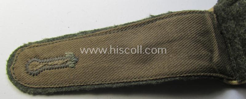 Single, WH (Heeres) NCO-type (ie. 'M40'- ie. 'M43'-pattern) shoulderstrap having the white-coloured branchcolour as was intended for - and clearly worn by! - a: 'Feldwebel der Infanterie-Truppen'
