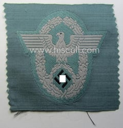 Police- (ie. 'Polizei'-) related armbadge (ie. arm-eagle) being...