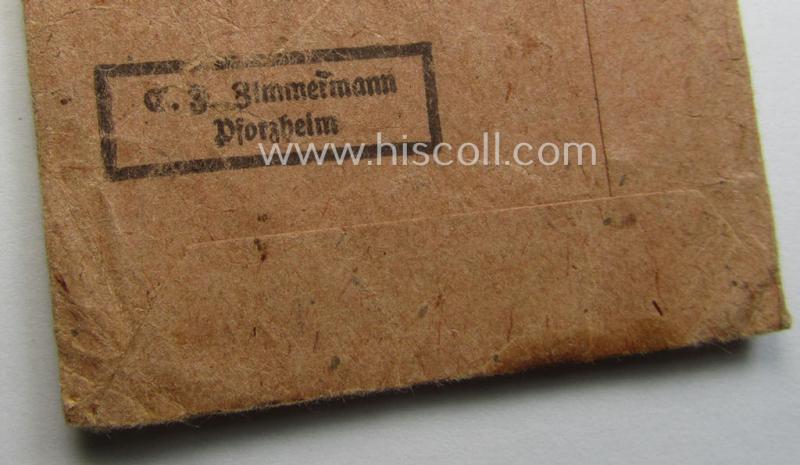 Empty 'Zellstoff'-based pouch as was intended for a medal: 'Winterschlacht im Osten 1941/42' as was produced by the: 'C.F. Zimmermann'-company (ie. 'Hersteller 20')