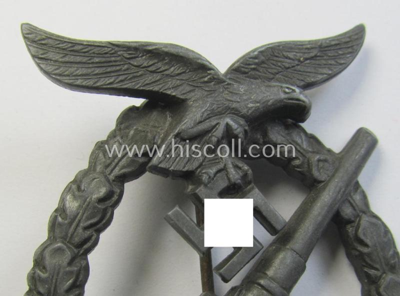 Later-war period- and/or: zinc- (ie. 'Feinzink'-) based- example of a maker- (ie. 'WH'-) marked, WH (Luftwaffe) 'Flakkampfabzeichen' (or: airforce anti-aircraft badge), as was produced by the desirable: 'Wilhelm Hobacher'-company