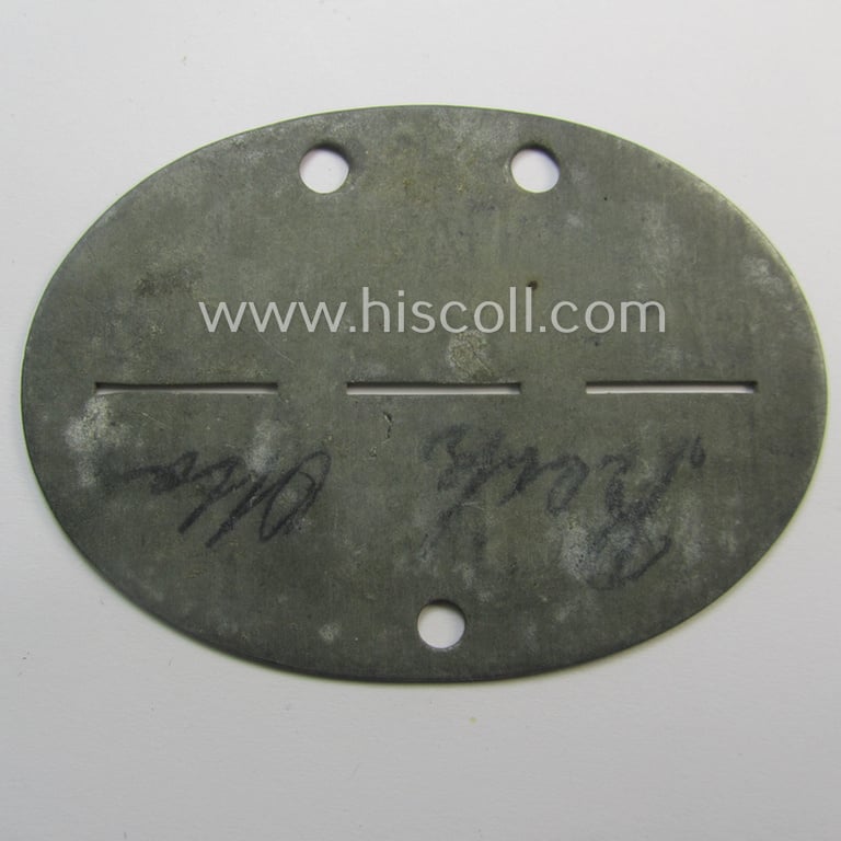Zinc-based, WH (Heeres) 'Gebirgsjäger'-related ID-disc bearing the clearly stamped unit-designation that reads: '8./Geb.Jäg.E.Btl. 98' and that comes as issued and/or worn