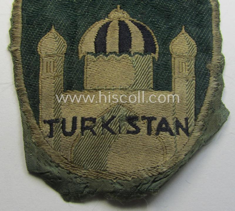 Truly worn 'BeVo'-type armshield (of the first pattern!) entitled: 'Biz Alla Bilen - Turkistan' (being a piece that was intended for a volunteer who served within the: 'Deutsche Wehrmacht' ie. within the: 'Turkistanisches Legion')