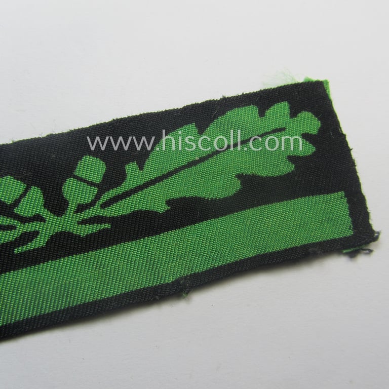 Attractive - clearly used albeit regrettably single! - officers'-pattern, WH (Heeres o. Waffen-SS) rank-insignia-bar (for usage on the camouflaged-uniforms) as used by a junior-officer holding the rank of: 'leutnant' (ie.: 'SS-Untersturmführer')
