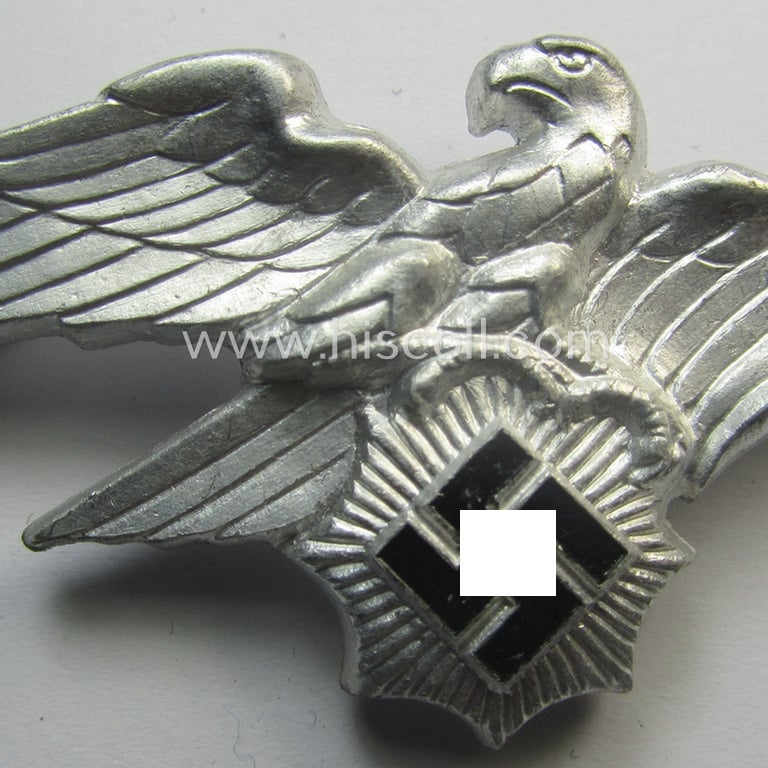 Officers'- (ie. evt. NCO-) pattern, aluminium-based so-called: 'Luftschutz' (ie. RLB-) visor-cap eagle being a maker- (ie. 'HA'-) marked example as was produced by the 'H. Aurich'-company
