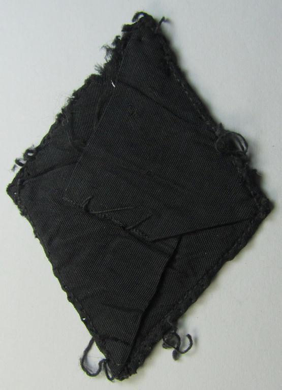 Neat - and clearly used- ie. worn! - N.S.K.K. (or: 'National Socialistisches Kraftfahr Korps') so-called: 'Kraftfahrraute des 2. Model' (so-called 'drivers'-diamond' of the 2nd and/or final pattern)