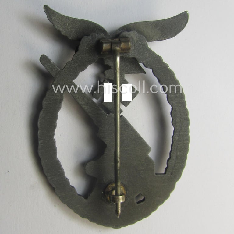 WH (Luftwaffe) 'Flakkampfabzeichen' being a very detailed albeit non-maker-marked example as was (I deem) produced by the: 'Steinhauer & Lück'-company